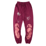 Maroon Sp5der Nocturnal Highway cotton track pants featuring white graphic designs on a comfortable relaxed fit.