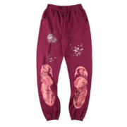 Maroon Sp5der Nocturnal Highway cotton track pants featuring white graphic designs on a comfortable relaxed fit.