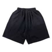 Front view of the black Sp5der cut sweatshorts featuring an elastic waistband and a comfortable, relaxed loose fit.