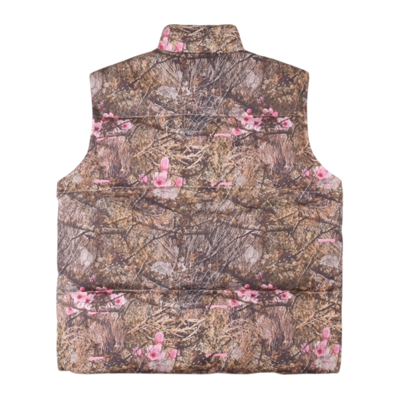The back view of the SP5DER Real Tree Puffer Vest featuring a distinctive camouflage pattern and insulated construction.