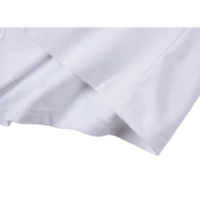 Close-up view of the premium fabric texture and construction details on the Sp5der Juan V2 white T-shirt.