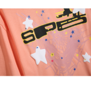Sp5der Print Graphic Tee Shirt in peach featuring bold spiderweb design and artistic star motifs for streetwear style
