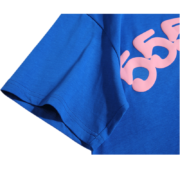 Close-up view of the sleeve and graphic print on the premium blue Sp5der Worldwide Star cotton T-shirt streetwear.