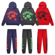 Three Sp5der Beluga hoodie and jogger tracksuit sets featuring a star-pattern design in black, red, and blue colors.