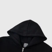 Black Sp5der Phantom Web hoodie featuring a premium adjustable hood detail and internal brand logo label size tag.