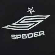 Close-up of the black Sp5der Pro double layer shorts featuring the iconic white star logo and branding detail.