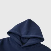 Close-up detail view of the premium heavyweight fleece hood on the authentic Sp5der OG Web Hoodie in Navy Blue.
