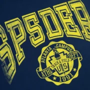 Close-up of the Sp5der Navy Campus Tee featuring a bold yellow graphic print on the front of the premium cotton shirt.