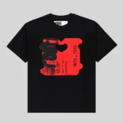 Front view of the SP5DER Black Toast Tee featuring a bold red bread tag graphic print with text on a black cotton shirt.
