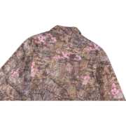 Back view of the Sp5der Trucker Jacket featuring a rugged Real Tree Camo print and decorative rhinestone details.