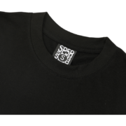 Close-up view of the Sp5der Black 55555 Spider Web Tee neck tag, showing authentic branding on the high-quality t-shirt.