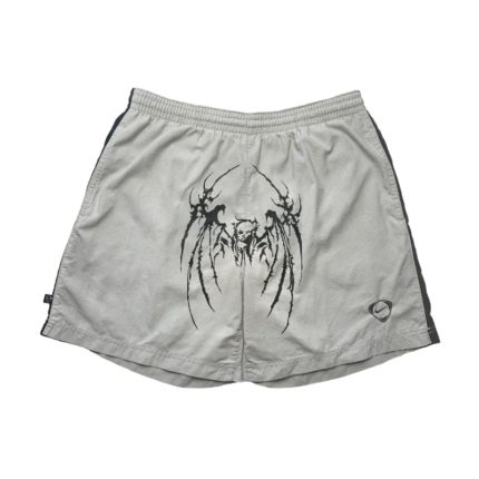 Light gray Sp5der streetwear shorts featuring a distinctive black graphic print and a comfortable elastic waistband.
