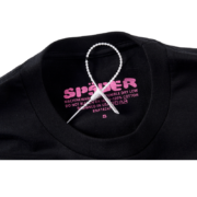 Detailed view of the Sp5der L'Araignee T-Shirt neck label showing brand logo, care instructions, and authenticity details.