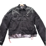 Sp5der Worldwide black denim jacket featuring signature rhinestone spider web detailing and a premium streetwear aesthetic.