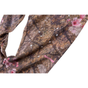 Detail view of the Sp5der Real Tree OG Web sweatpants featuring a camouflage pattern with iconic web design.