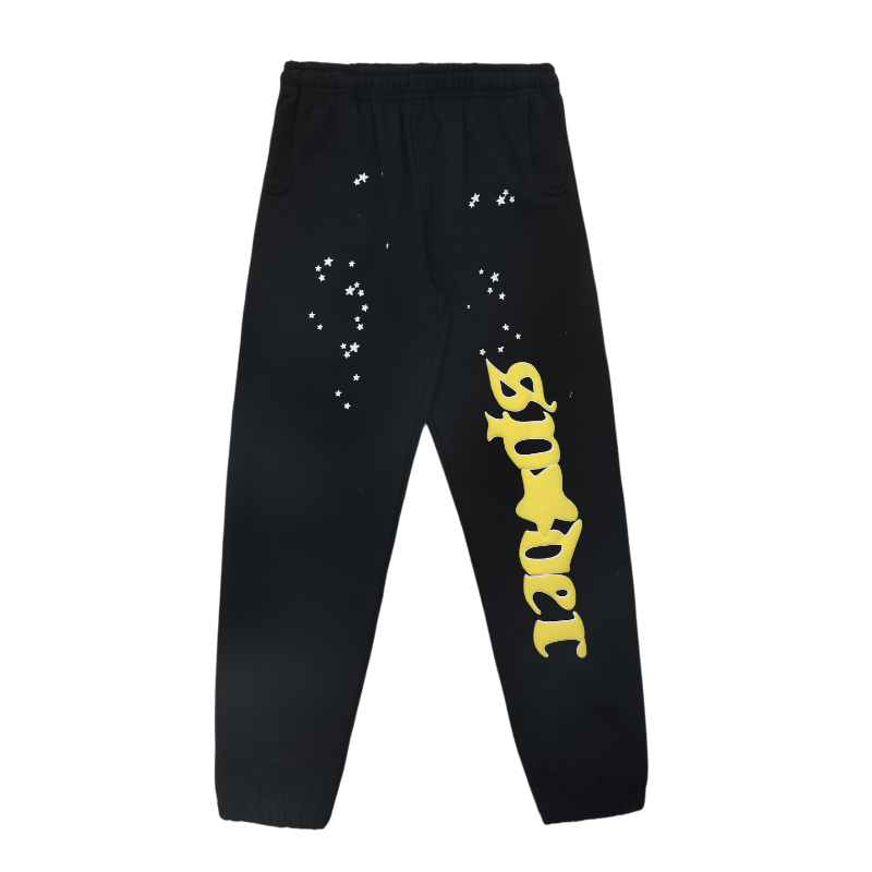 Black Sp5der Jeffery streetwear sweatpants featuring a yellow logo print and white star accents on a loose fit fabric.