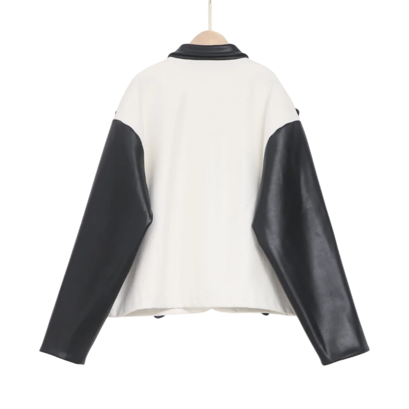 The back view of the stylish Roam The Halls Sp5der jacket featuring a clean white design with contrasting black sleeves.