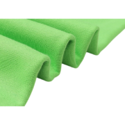 Close up view of the green premium cotton fabric used for the Sp5der Websuit sweatpants for a soft texture look.