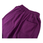 Back view of purple Sp5der OG Web Logo sweat shorts featuring a comfortable elastic waistband and a single back pocket.