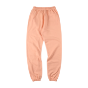 Back view of the vibrant peach Sp5der Bellini sweatpants featuring an elasticated waistband and a comfortable loose fit.