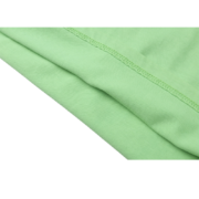 Close-up of the premium fabric texture and reinforced stitching on the Slime Green Sp5der Worldwide streetwear t-shirt.
