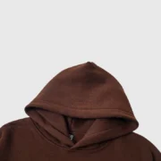 Close-up view of the hood on the brown Sp5der OG Web V2 heavyweight cotton-blend fleece streetwear hoodie.