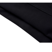 Close up of the premium black cotton fabric detail used on the SP5DER Worldwide Web streetwear t-shirt.