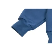 Close-up view of the ribbed sleeve detail on the premium navy-blue Sp5der cropped hoodie for a stylish urban look.
