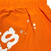 Orange Sp5der OG Web double layer shorts showing the signature graphic detail with white stars and lettering.
