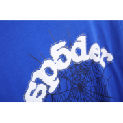 A close-up view of the Royal Blue SP5DER Young Thug T-shirt featuring the brand's iconic white spider web logo design.