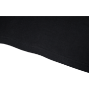 A close-up view of the bottom hem detail on a premium black SP5DER Gothic Punk T-shirt with high-quality fabric.