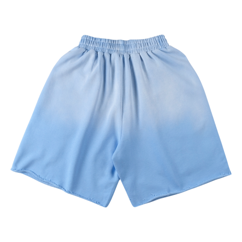 The back view of the premium Sp5der Cut Sweatshort in a timeless vintage blue wash, featuring a modern silhouette.