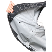 A close-up view of the interior lining and detailed stitching inside the black Sp5der Number Nine streetwear jacket.