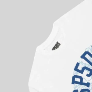 A close-up view of the Sp5der Cross Country Slub Tee showing the detailed white neckline and branded collar label.