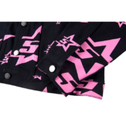 Sp5der 5 Star Trucker Jacket in black with bold pink star graphic patterns and silver button detailing for streetwear
