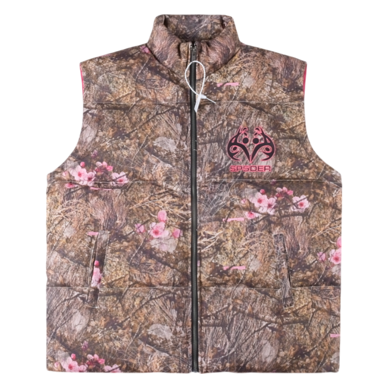 SP5DER Real Tree Puffer Vest featuring iconic camouflage pattern and pink branding, water-resistant insulated design.