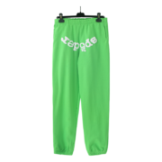 Green Sp5der Websuit sweatpants with loose fit, iconic web design, and high-quality construction for streetwear fashion.