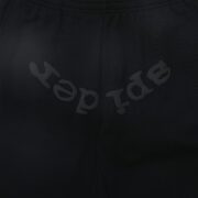 Close-up view of the Sp5der OG Tree Camo Sweatpant in black, featuring subtle branding and premium fabric texture.