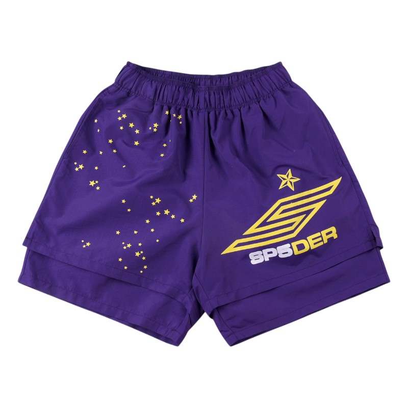 Sp5der SP5 Pro purple athletic performance shorts featuring a yellow spider web logo and star graphic print design.