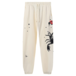 Sp5der x Mariah the Scientist Scorpion Sweatpants in cream featuring a distinctive black scorpion and star graphic print.