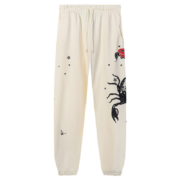 Sp5der x Mariah the Scientist Scorpion Sweatpants in cream featuring a distinctive black scorpion and star graphic print.
