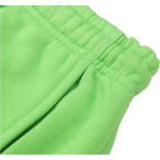 Close-up view of the green Sp5der Websuit sweatpants highlighting the comfortable elastic waistband and side pocket.