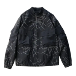 Front view of the black Sp5der Number Nine jacket featuring a bold web-like graphic print and functional cargo pockets.
