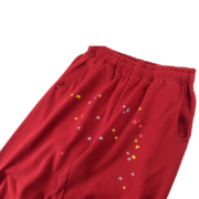 SP5DER Logo Sweatpants in maroon featuring a comfortable fleece material and a distinct colorful star graphic detail.