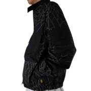 A side view of the black Sp5der Number Nine jacket featuring a distinctive geometric web-inspired graphic pattern design.