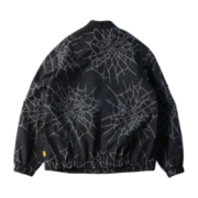 Back view of the Sp5der Number Nine jacket featuring an all-over intricate spiderweb graphic design in streetwear style.