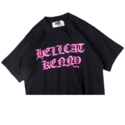 Front view of the SP5DER Hellcat Kenny black graphic t-shirt featuring bold pink stylized text for a streetwear look
