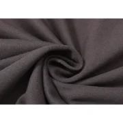 Detailed close-up view of the premium slate-green fabric texture used on Sp5der Wait Web sweatpants for authentic style