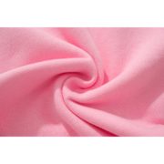 Close-up view of the premium fabric texture used in the pink Sp5der Atlanta unisex sweatpants for streetwear style.