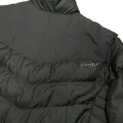 Back view of the Sp5der Men’s Light Down Puffer Jacket featuring sleek black insulation and branded detailing.